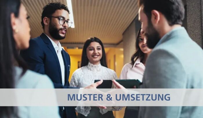 Eine Gruppe von internationalen Arbeitskräften steht zusammen und führt ein Gespräch